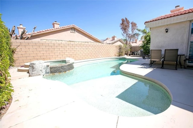 79534 Dandelion Dr, La Quinta, CA 92253 - view of swimming pool featuring a patio area, a fenced backyard, and a pool with connected hot tub