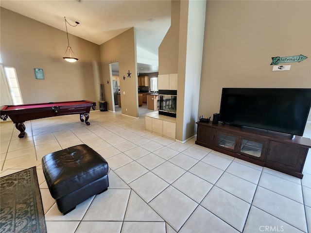 game room featuring light tile patterned flooring, high vaulted ceiling, and billiards