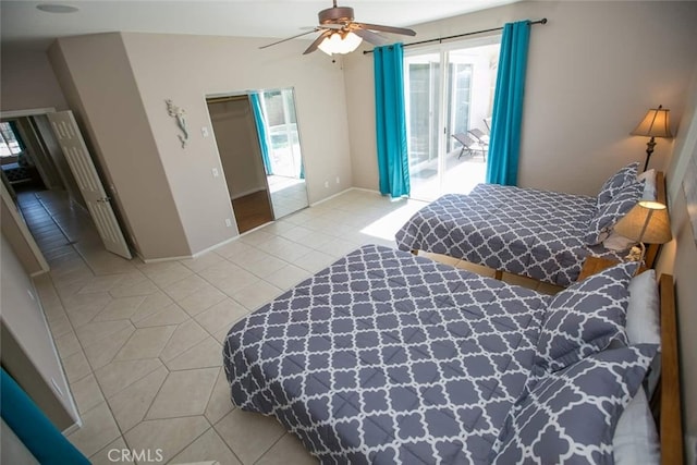 tiled bedroom featuring a closet, access to outside, and ceiling fan