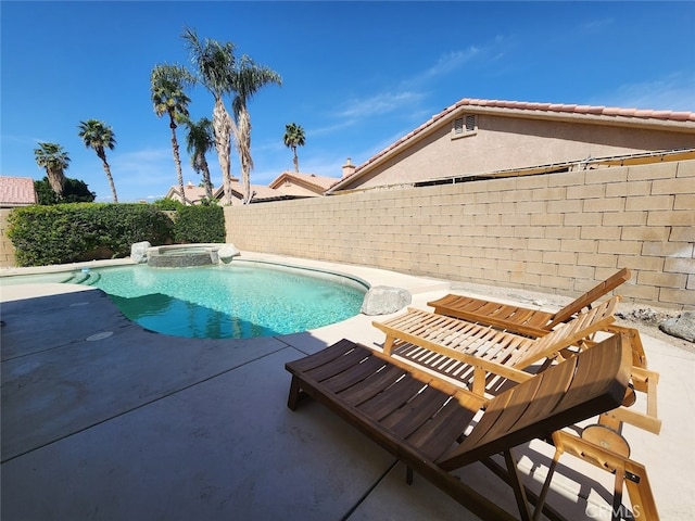 79534 Dandelion Dr, La Quinta, CA 92253 - view of swimming pool with a patio, a fenced backyard, and a pool with connected hot tub