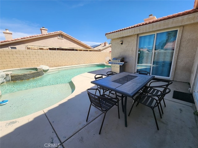 79534 Dandelion Dr, La Quinta, CA 92253 - view of pool with a patio, a fenced backyard, a pool with connected hot tub, area for grilling, and outdoor dining area