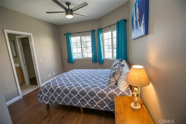 79534 Dandelion Dr, La Quinta, CA 92253 - bedroom featuring wood finished floors, baseboards, and a ceiling fan