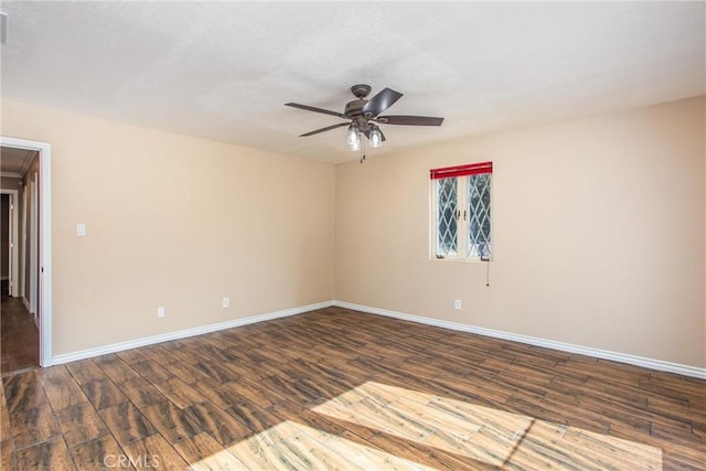 unfurnished room with ceiling fan, a textured ceiling, wood finished floors, and baseboards