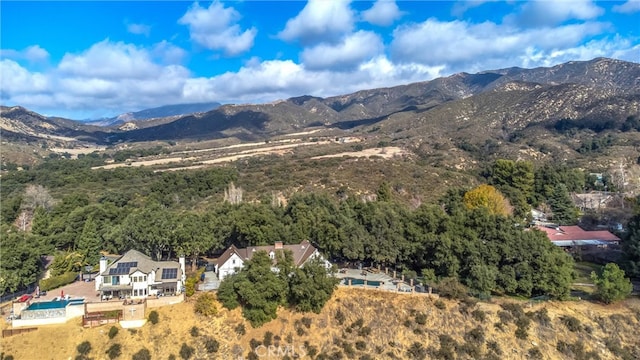 bird's eye view with a mountain view