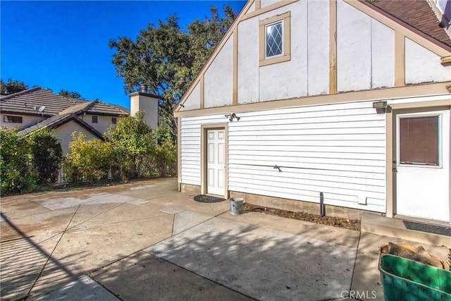 view of home's exterior featuring a patio area