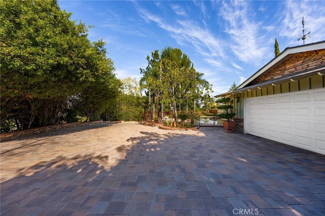 view of patio / terrace with a garage