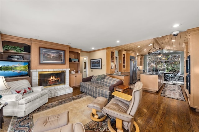 living room with dark hardwood / wood-style floors and lofted ceiling