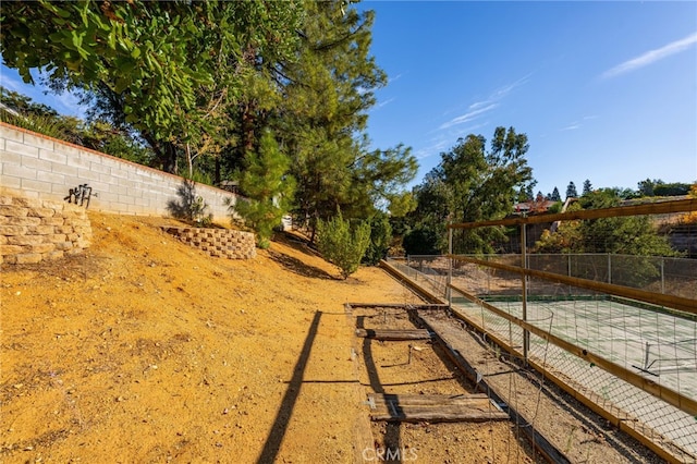 view of yard featuring fence