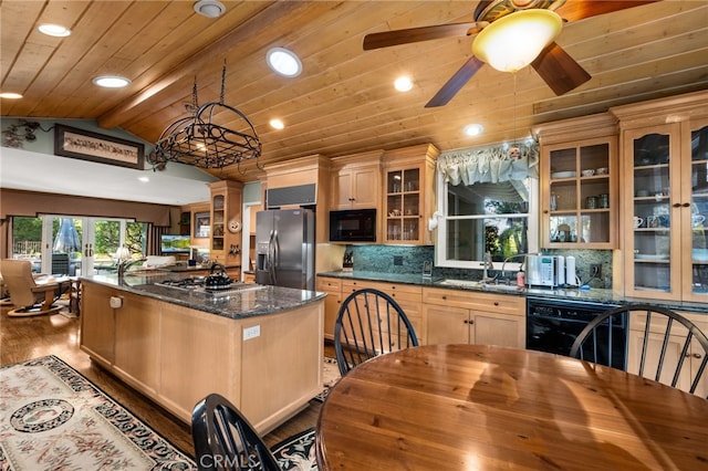 kitchen with light brown cabinets, wooden ceiling, lofted ceiling with beams, black appliances, and hardwood / wood-style flooring