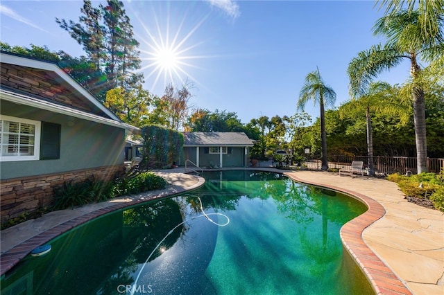 view of pool with fence, a patio area, and a fenced in pool