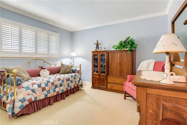 bedroom with carpet flooring and ornamental molding