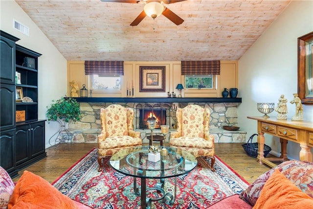 living room featuring a ceiling fan, wood finished floors, wood ceiling, lofted ceiling, and visible vents