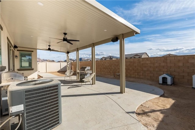 view of patio / terrace with central AC unit, ceiling fan, and a grill