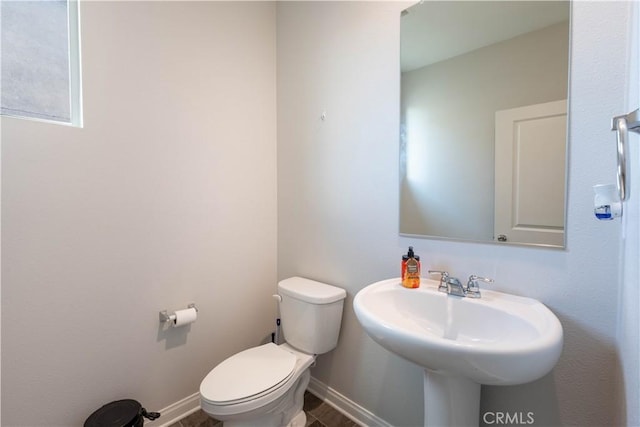 bathroom with sink and toilet