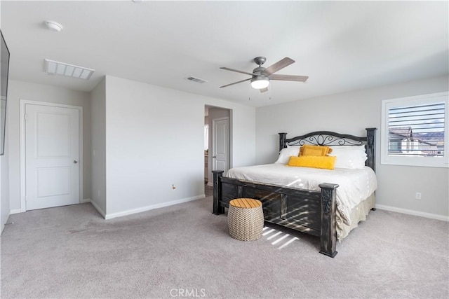 bedroom featuring ceiling fan and light colored carpet