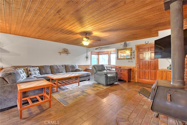 living room with wood ceiling, ornate columns, light wood-style flooring, and ceiling fan