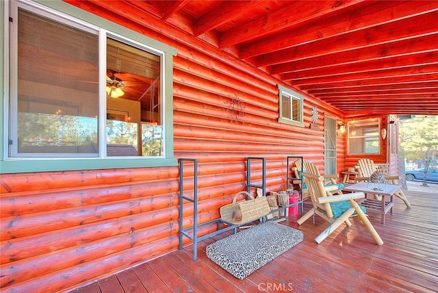 wooden terrace featuring a porch