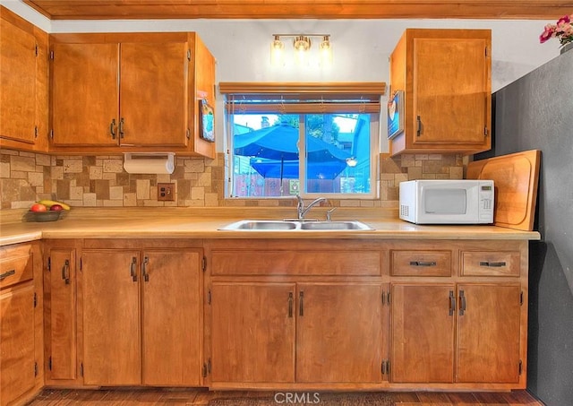 kitchen with sink and decorative backsplash