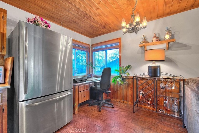 office area with wood ceiling, wood finished floors, and a chandelier