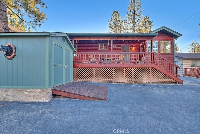 view of front of property featuring a deck