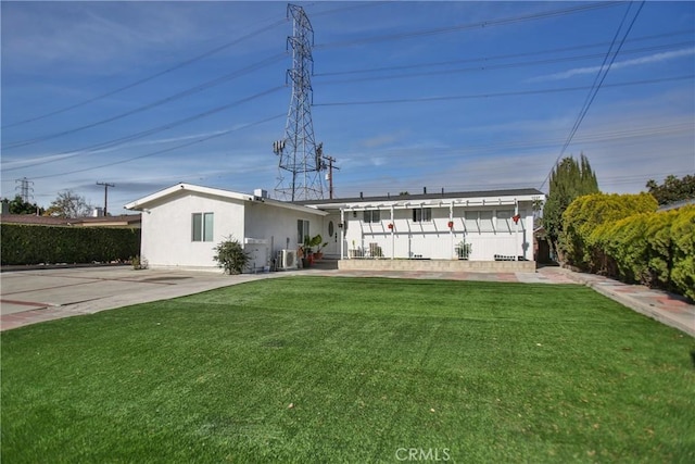 ranch-style house with a front yard