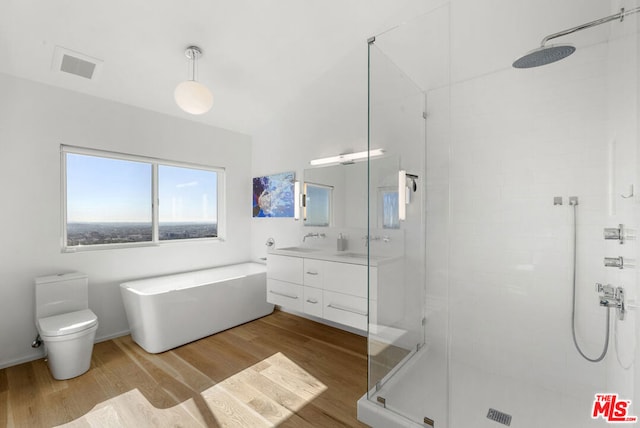 full bathroom featuring toilet, vanity, independent shower and bath, and hardwood / wood-style flooring