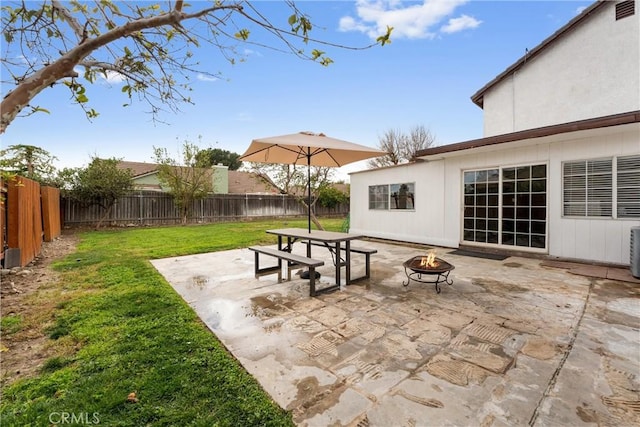 view of patio / terrace featuring a fire pit