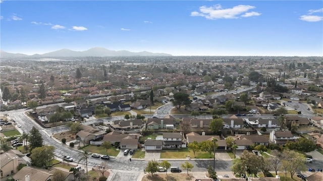 drone / aerial view featuring a mountain view