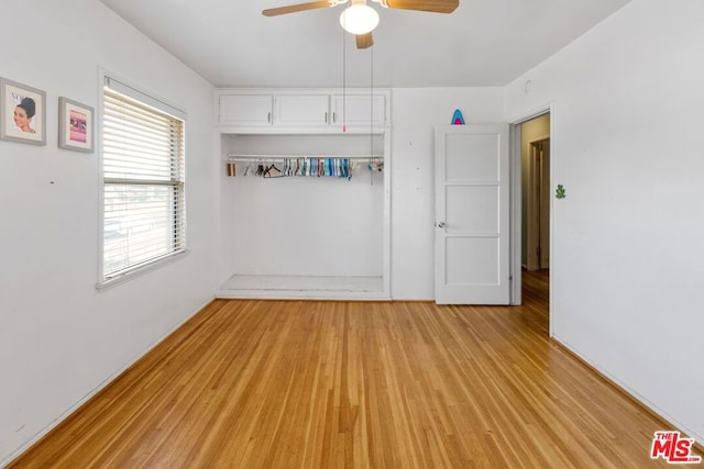 unfurnished room featuring ceiling fan and light hardwood / wood-style floors