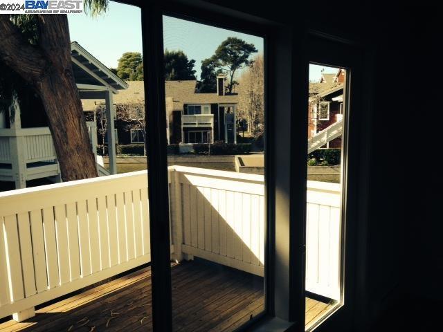 entryway with hardwood / wood-style flooring and a healthy amount of sunlight