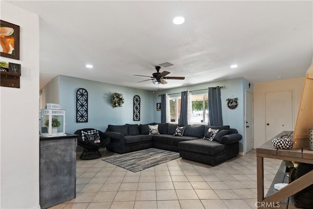 tiled living room with ceiling fan