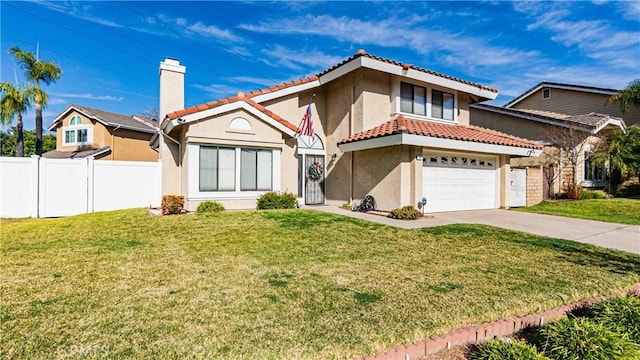 mediterranean / spanish home featuring a garage and a front lawn