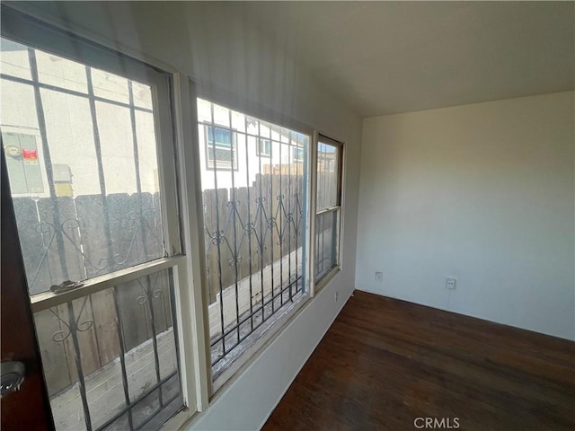 interior space with dark hardwood / wood-style flooring