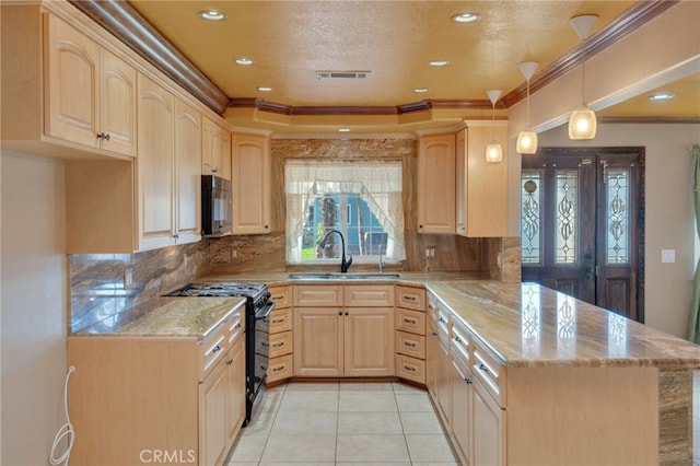 kitchen featuring kitchen peninsula, light brown cabinets, sink, and black appliances