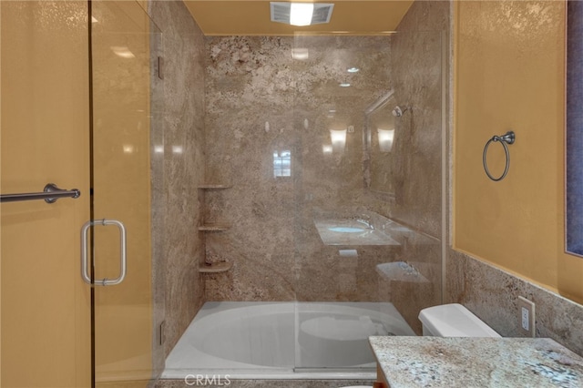 full bathroom with vanity, toilet, shower with separate bathtub, and tile walls