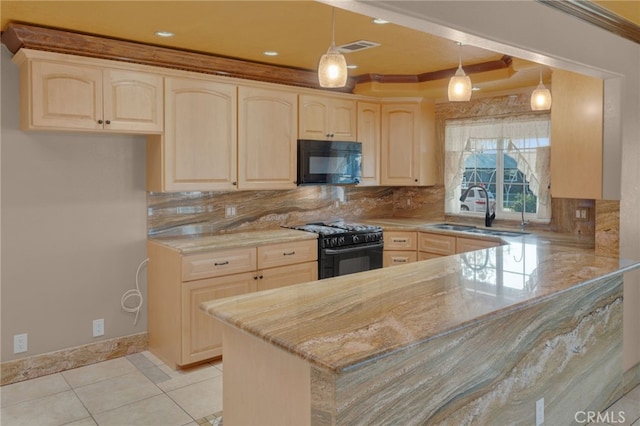 kitchen with black appliances, decorative backsplash, pendant lighting, and kitchen peninsula