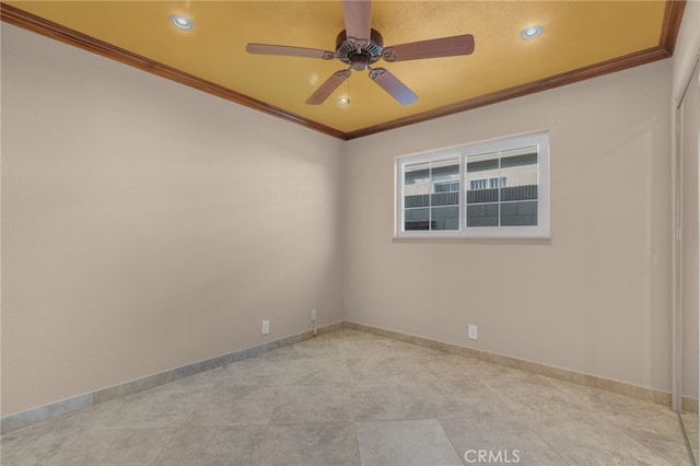 unfurnished room featuring a textured ceiling, ceiling fan, and crown molding