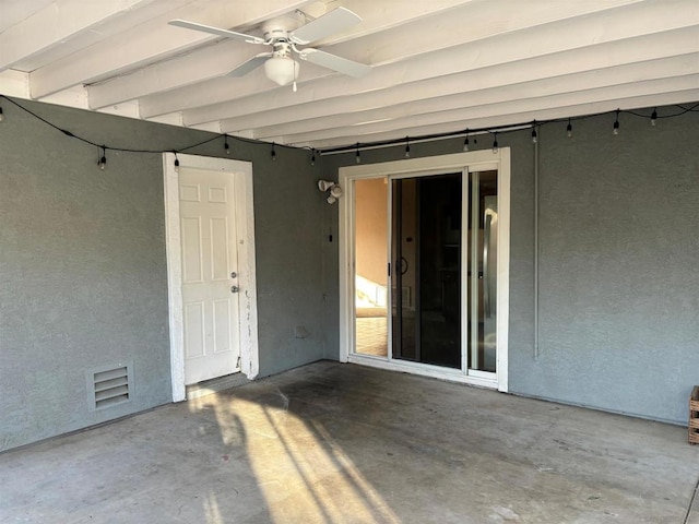 view of patio featuring ceiling fan