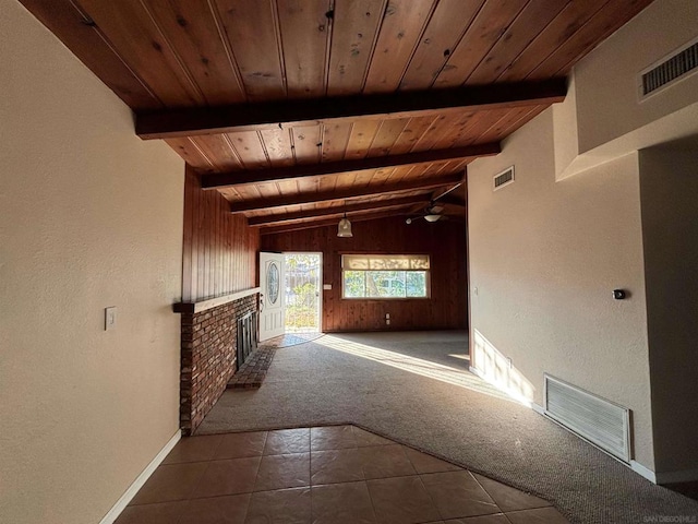 corridor featuring carpet floors, wooden ceiling, and lofted ceiling with beams