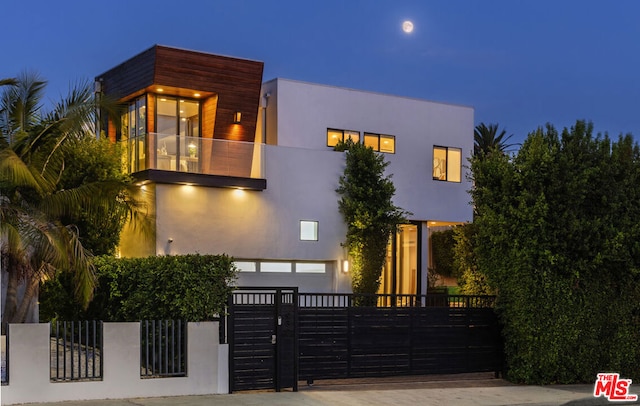 contemporary home with a balcony