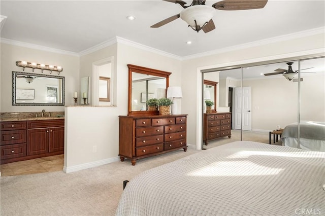 bedroom with light colored carpet, a closet, ornamental molding, and ceiling fan