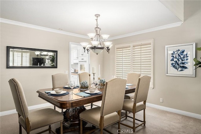 dining space featuring an inviting chandelier, carpet, and ornamental molding