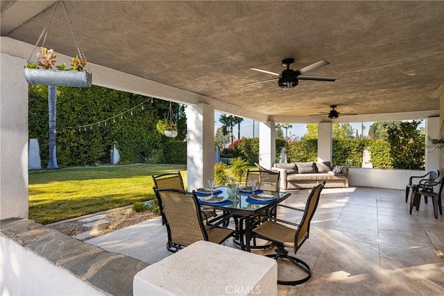 view of patio with ceiling fan