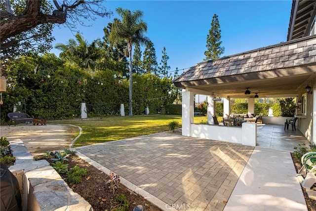 view of patio / terrace with ceiling fan