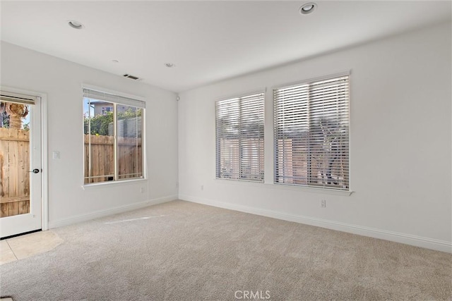 view of carpeted spare room