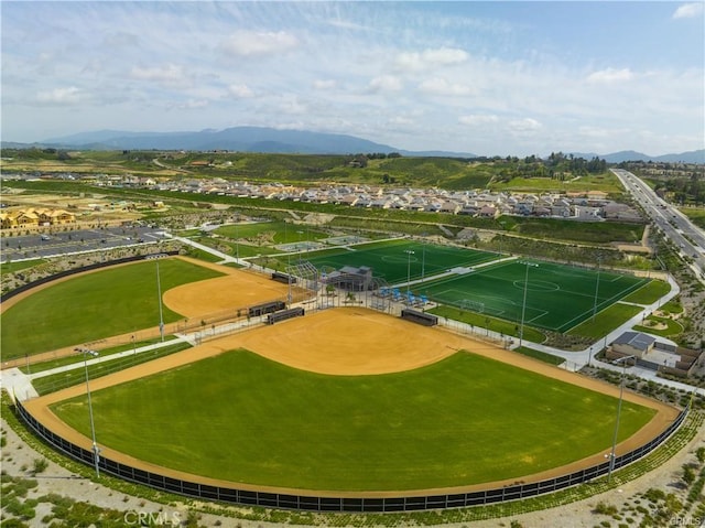 drone / aerial view featuring a mountain view