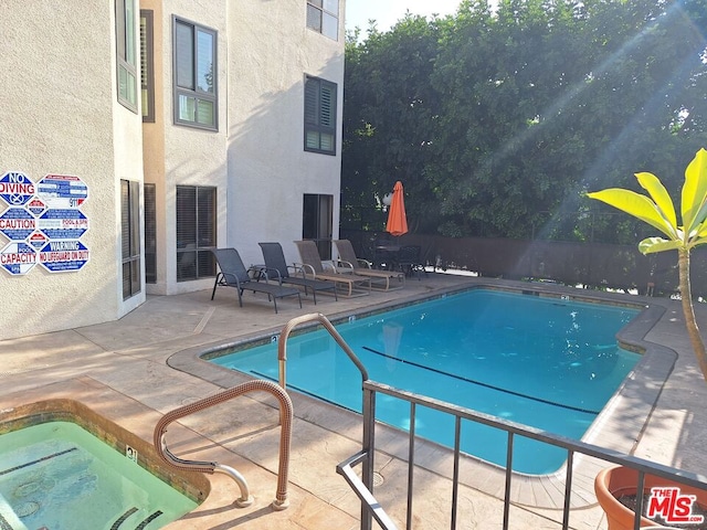 view of pool with a patio area