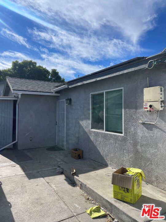 rear view of property with a patio