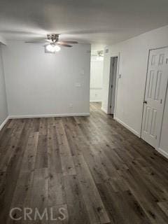 unfurnished room with ceiling fan and dark wood-type flooring