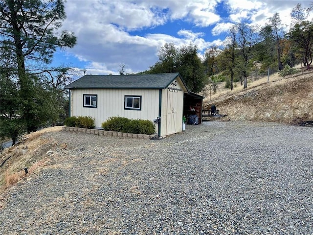 15223 Ledgewood Dr, Redding, CA 96001 - view of outbuilding featuring an outbuilding and gravel driveway